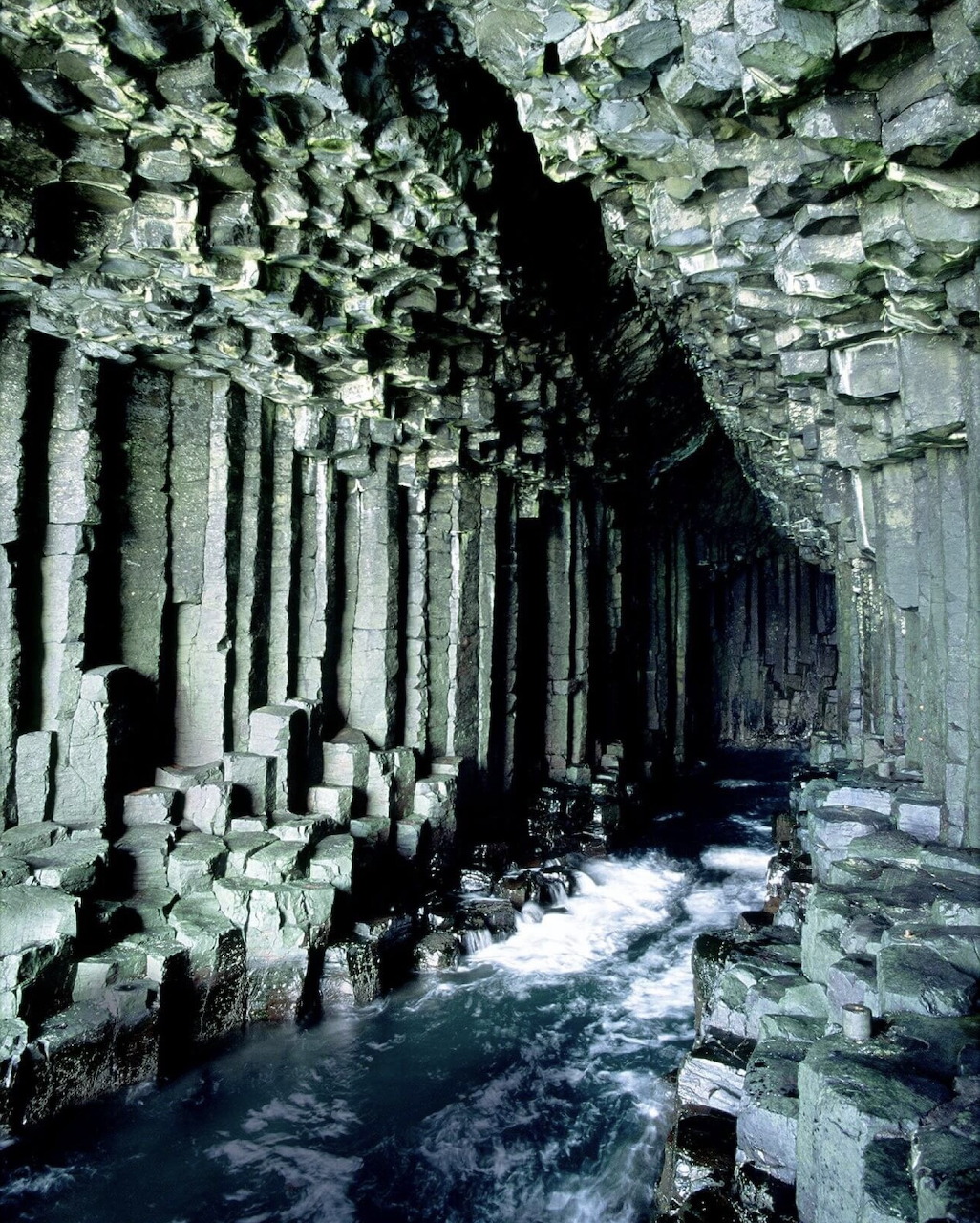 Fingal's Cave with hexagonal basalt columns and sea water, Isle of Staffa, Scotland