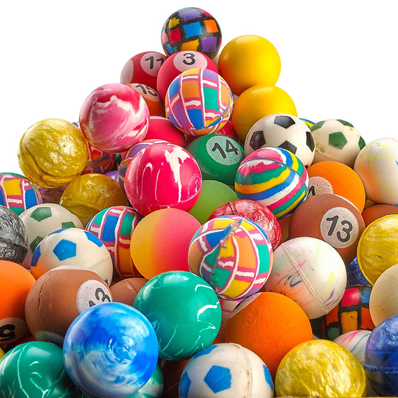 Large collection of colorful balls including soccer balls, numbered billiard balls, and decorative spheres piled together