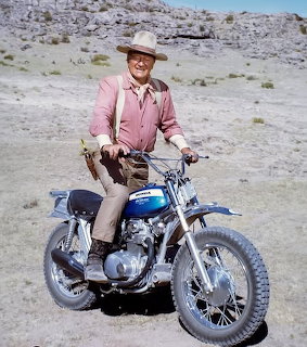 Cowboy on Motorcycle in Desert