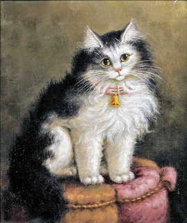 Fluffy black and white cat with yellow eyes and gold bell sitting on a clay pot