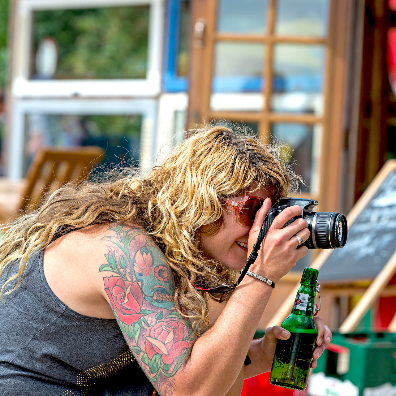 Woman Photographer with Grolsch Beer