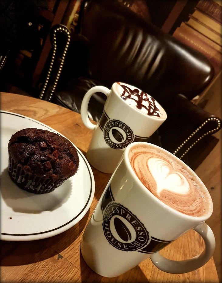 Cup of coffee in a cozy, warm setting