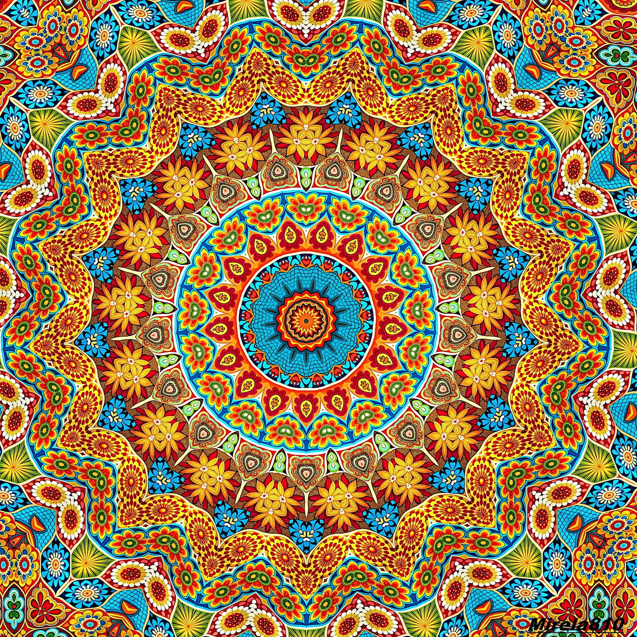 Ornate circular mandala with symmetrical geometric patterns in warm orange, turquoise, and yellow tones
