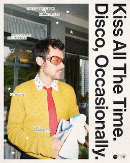 Harry Styles album promo poster, wearing yellow cardigan and orange sunglasses with bold text overlay