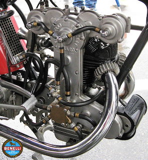 Vintage Benelli 175cc twin cam racing motorcycle engine with exposed mechanical parts