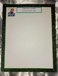 Blank white poster with glittery dark border and small portrait at the top