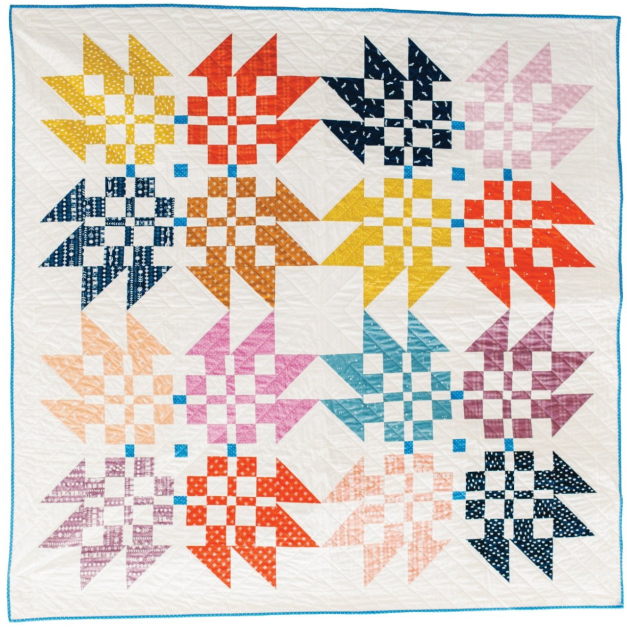 Colorful geometric quilt with Bear Paw pattern blocks in yellow, orange, red, blue, pink, and teal on white
