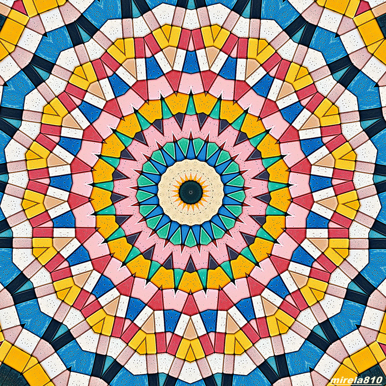 Colorful geometric mandala with symmetrical radial pattern in rainbow hues