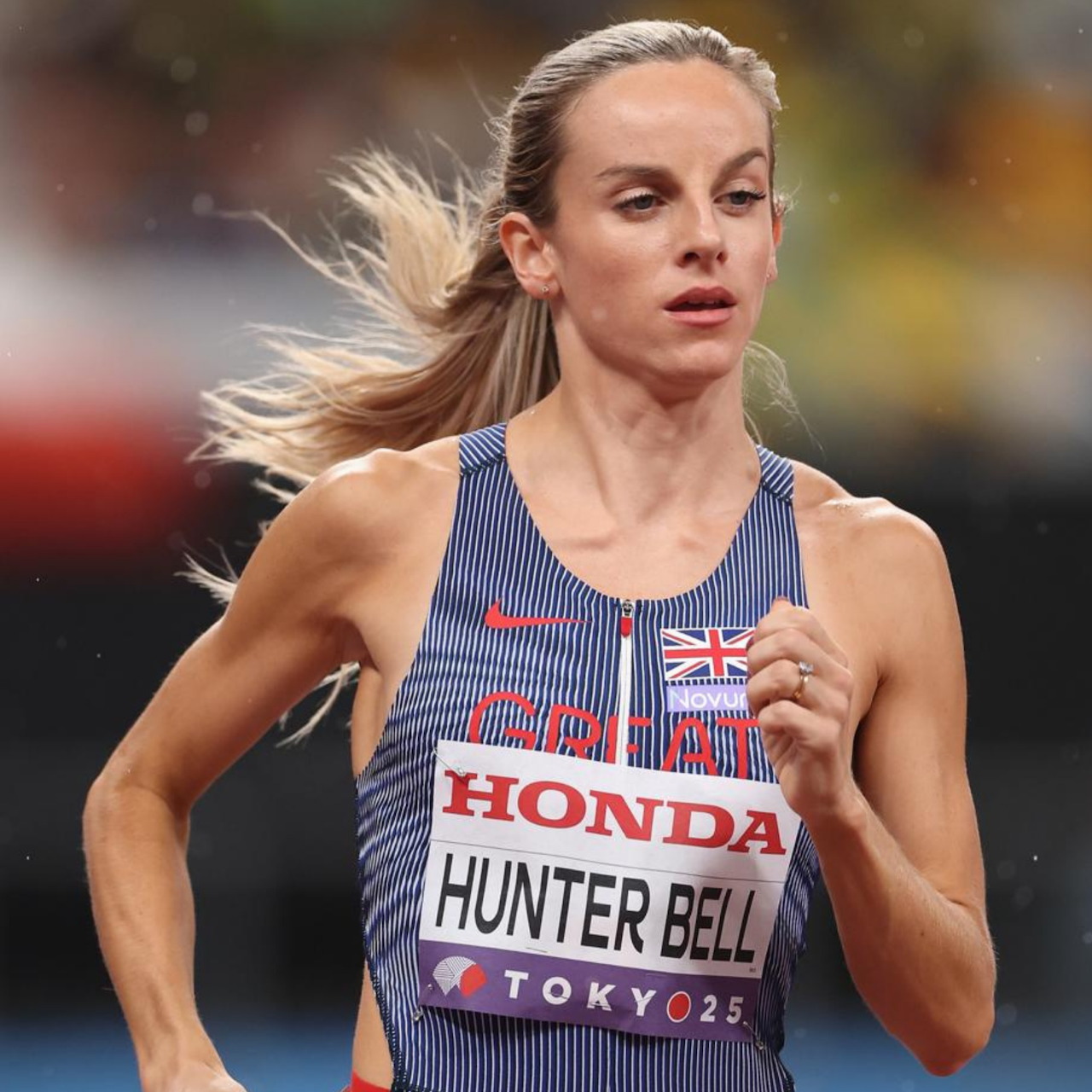 Track athlete Hunter Bell running in a Great Britain uniform during a race