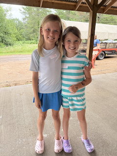 Two Girls Under Pavilion