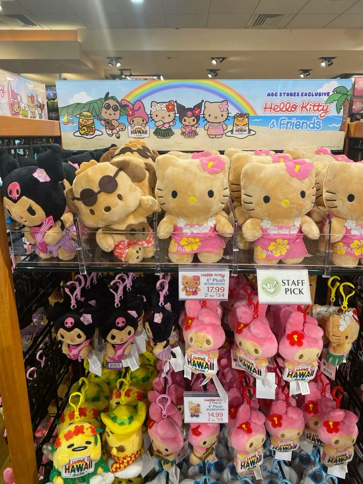Group of Hello Kitty plush toys arranged together