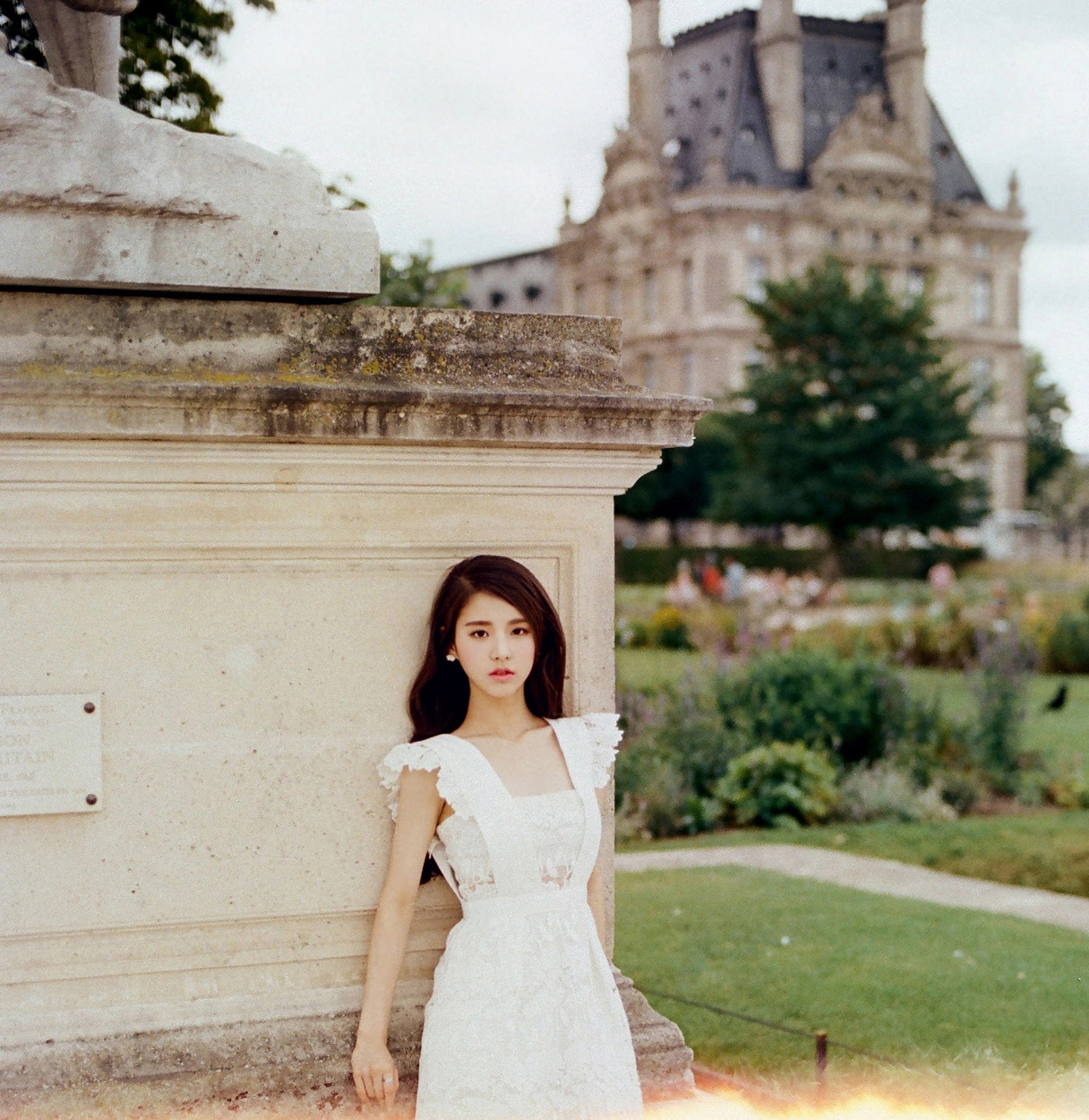 Woman in White Dress Paris Garden