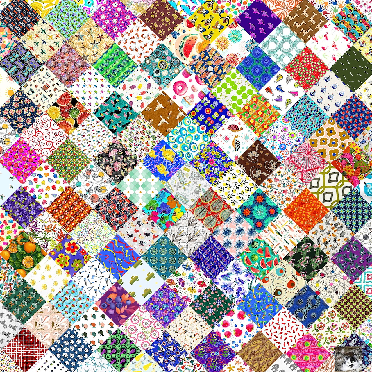 Colorful patchwork quilt with diverse fabric patterns in diagonal squares