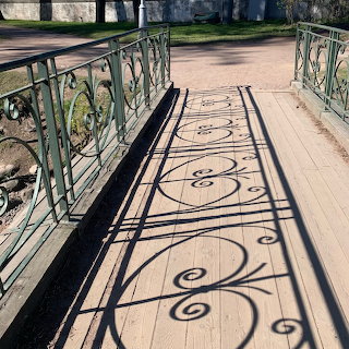 Ornate Fence Shadows
