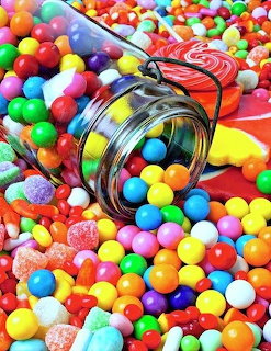 Colorful Candies Spilling From Jar