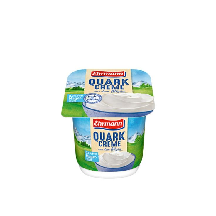 Cup of quark cream dairy dessert on a white background