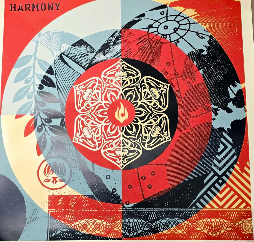 Street art print with ornate mandala flower surrounded by layered geometric patterns in red, black, and cream