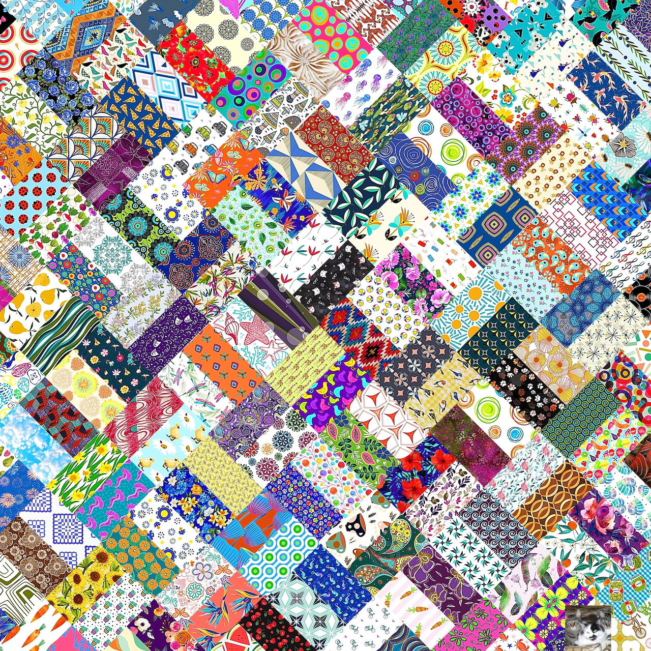 Colorful patchwork quilt with diverse fabric patterns arranged in diagonal strips
