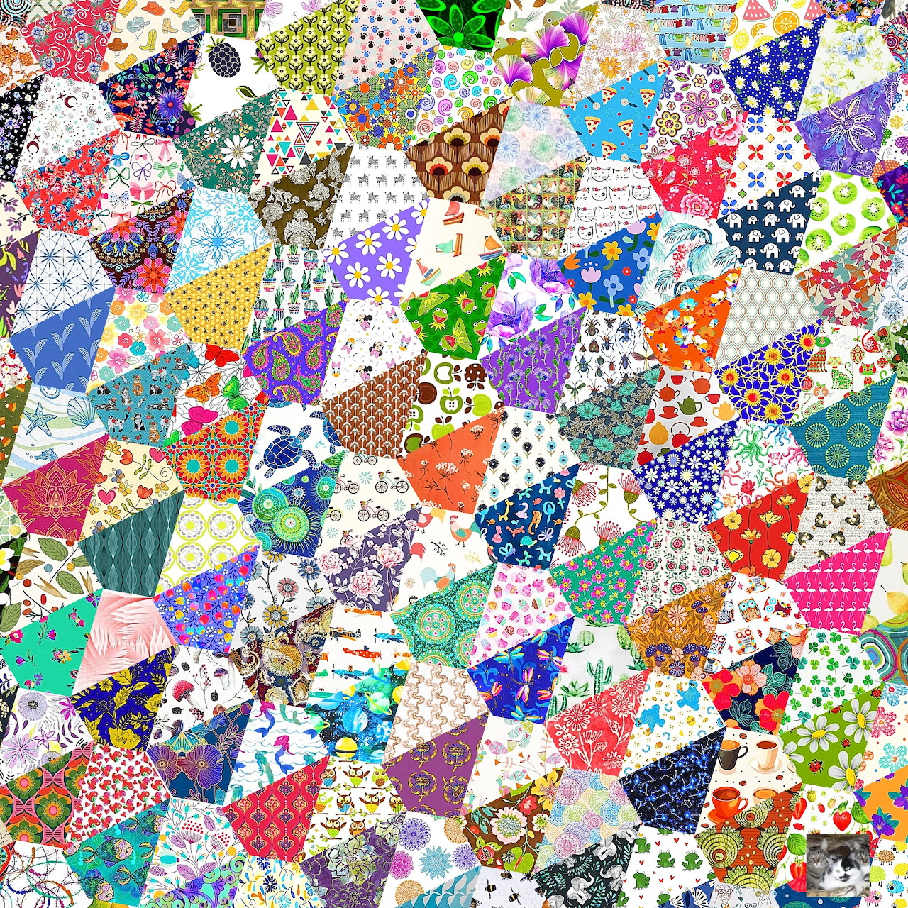 Colorful hexagonal patchwork quilt with floral, polka dot, and geometric fabric patterns in various bright colors
