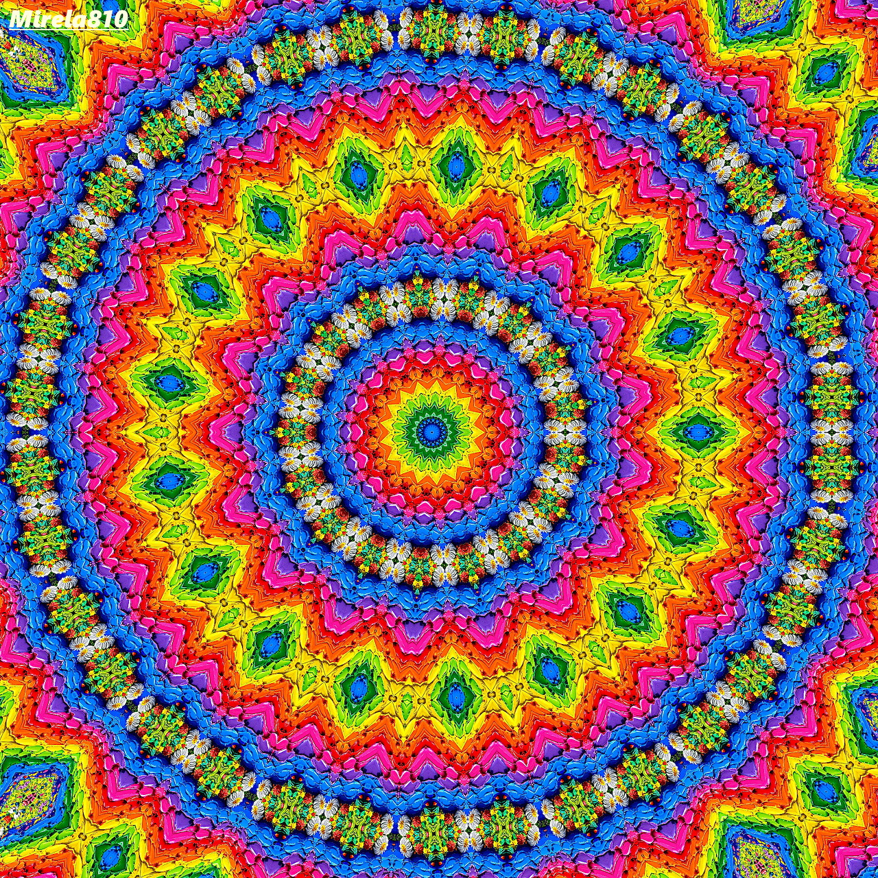 Bright symmetric mandala with rainbow concentric circles and geometric patterns on multicolor background