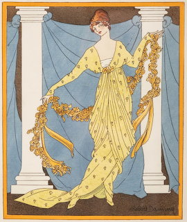 1912 French fashion plate illustration of a woman in a yellow gown with golden floral garlands and blue drape backdrop