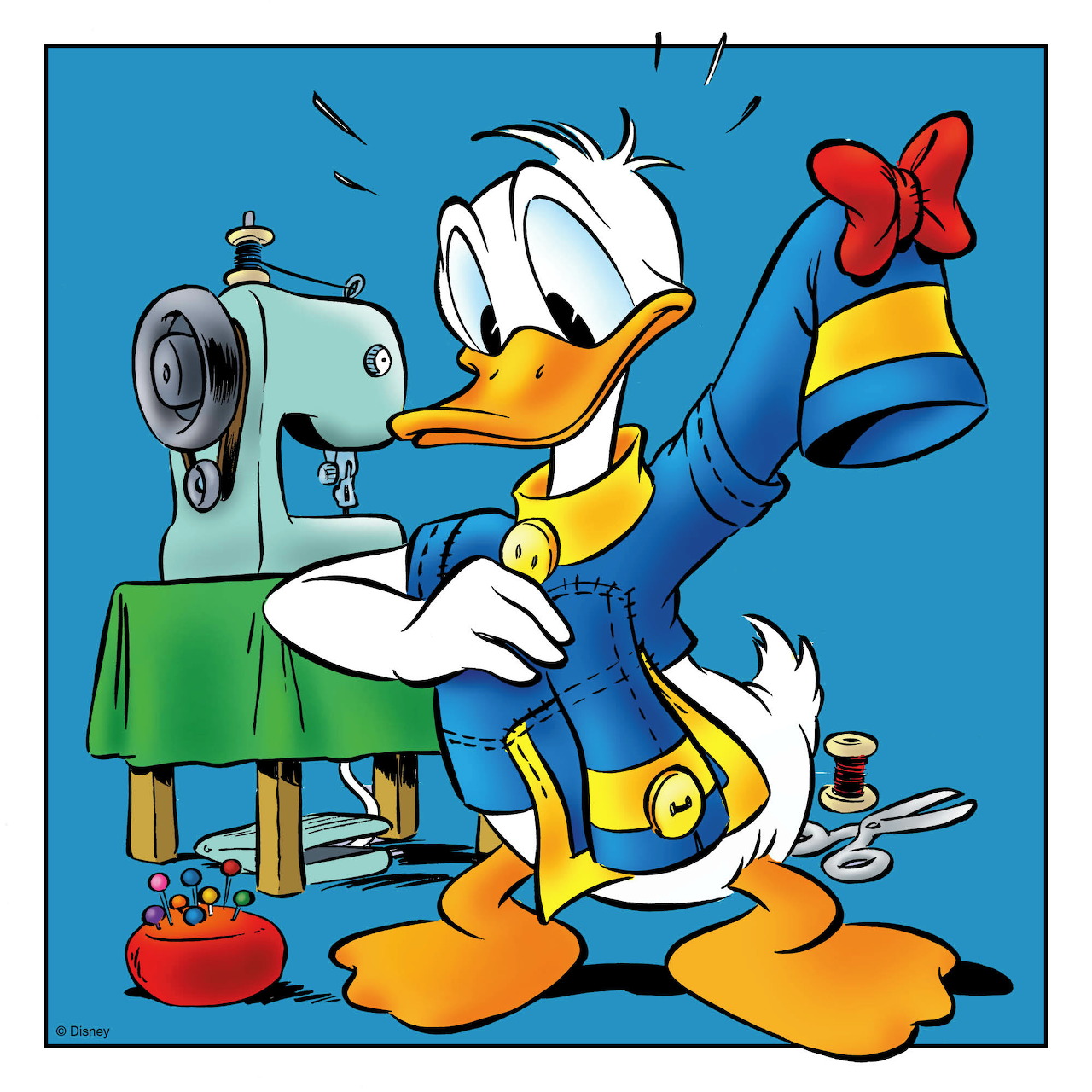 Donald Duck cartoon standing by a sewing machine and holding up a blue hat