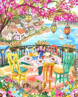 Colorful painted balcony with table, flowers, cat, and a riverside village under pink blossoms