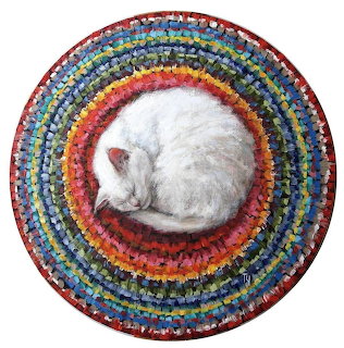 White Cat on Colorful Rug