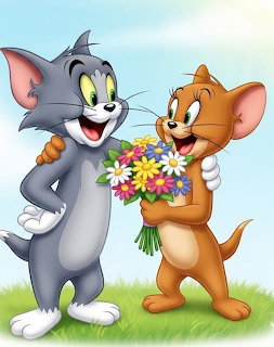 Tom cat giving Jerry mouse a bouquet of colorful flowers on a grassy hill with blue sky