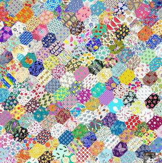 Colorful patchwork collage of many overlapping patterned fabric pieces