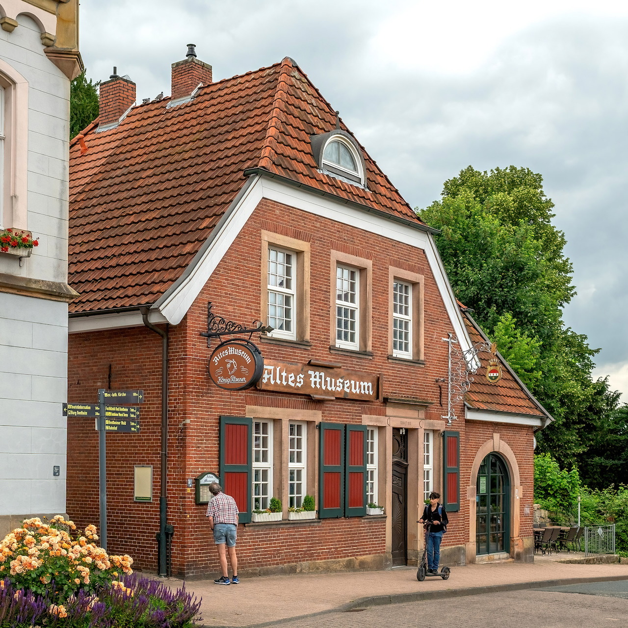 Historic brick Altes Museum building with orange tile roof in Bad Bentheim, Germany