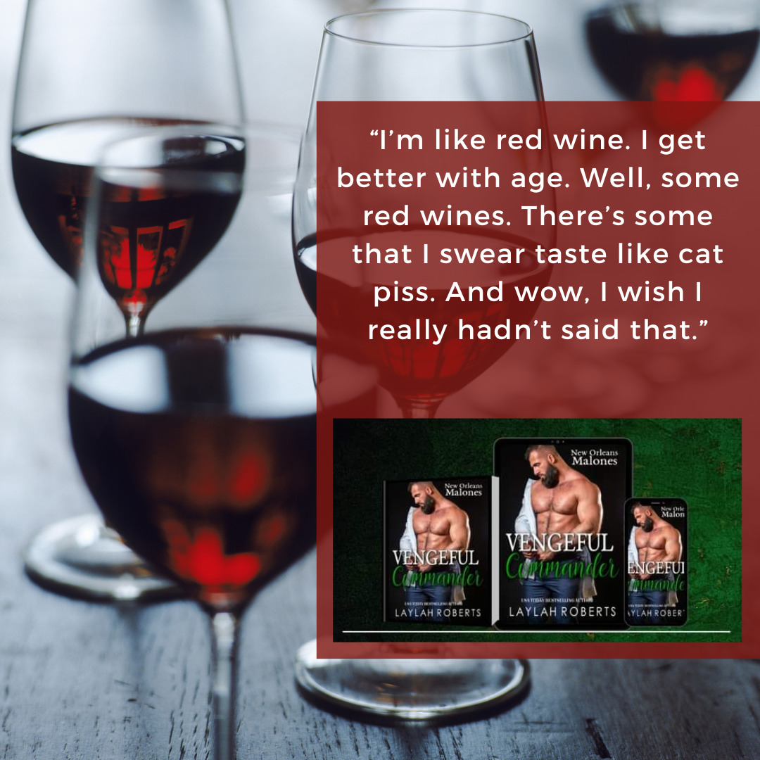 Red wine glasses beside romance novel covers with wine-themed quote on card
