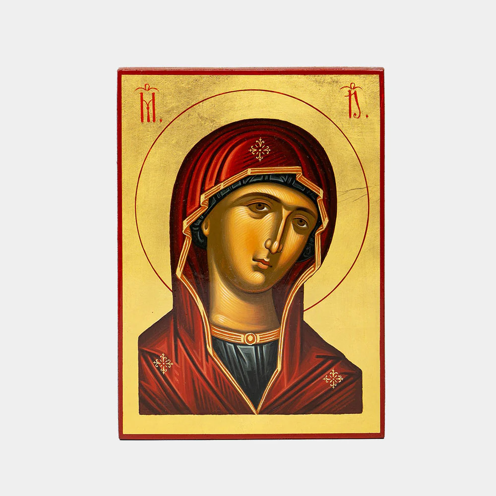 Traditional religious icon of the Virgin Mary with a red veil on a gold background