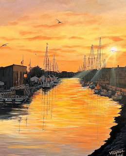 Painting of sailboats in a harbor canal at sunset with golden sky and water reflections