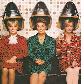 Women Under Hair Dryers