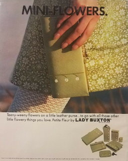 Vintage ad with a hand holding a green Lady Buxton purse in front of a floral dress