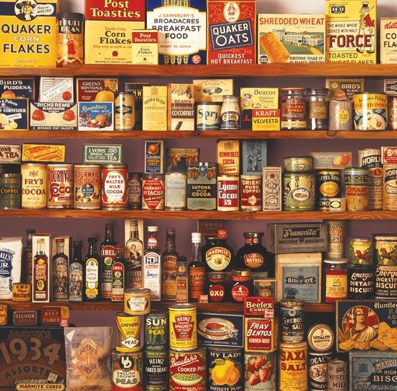 Vintage store shelves filled with retro food boxes, cans, jars, and bottles
