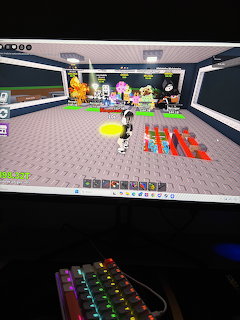 Minecraft game screenshot showing interior room with colorful furniture and decorative items