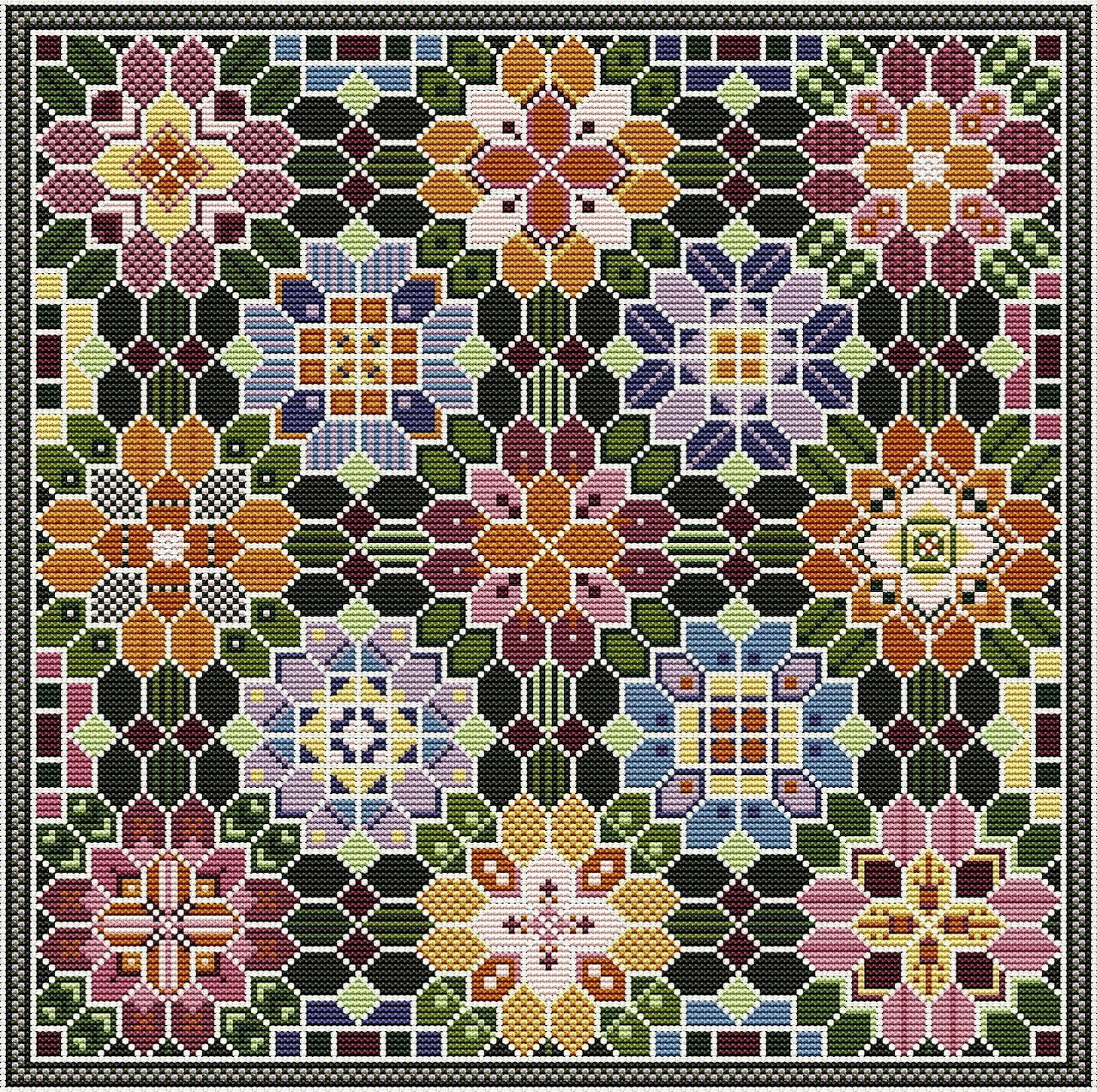 Colorful cross stitch pattern with symmetrical floral designs in various colors on a dark background
