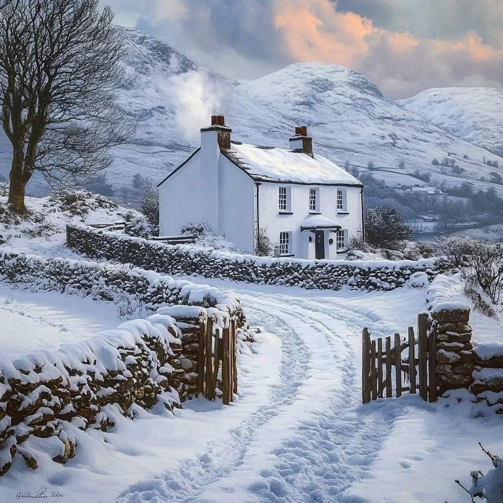 White cottage in snowy landscape with stone walls, wooden gate, and mountains in background under colorful winter sky