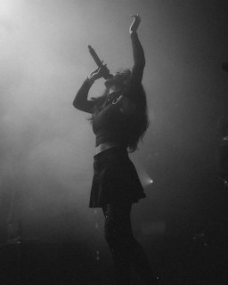 Singer Stage Silhouette