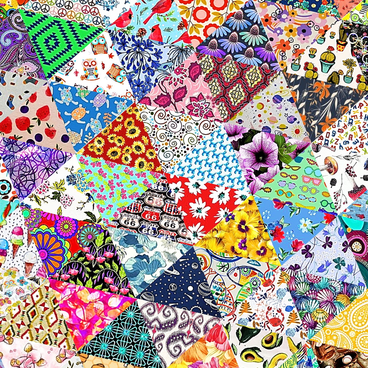 Colorful patchwork quilt with varied fabric patterns including flowers, dots, geometric shapes, and abstract designs