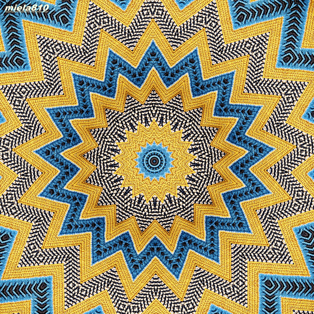 Ornate mandala with blue and gold geometric star pattern radiating from center