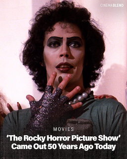 Person in dramatic theatrical makeup and costume with dark curly hair and sparkling details