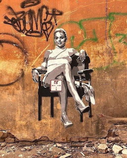 Banksy Street Art Woman in Chair