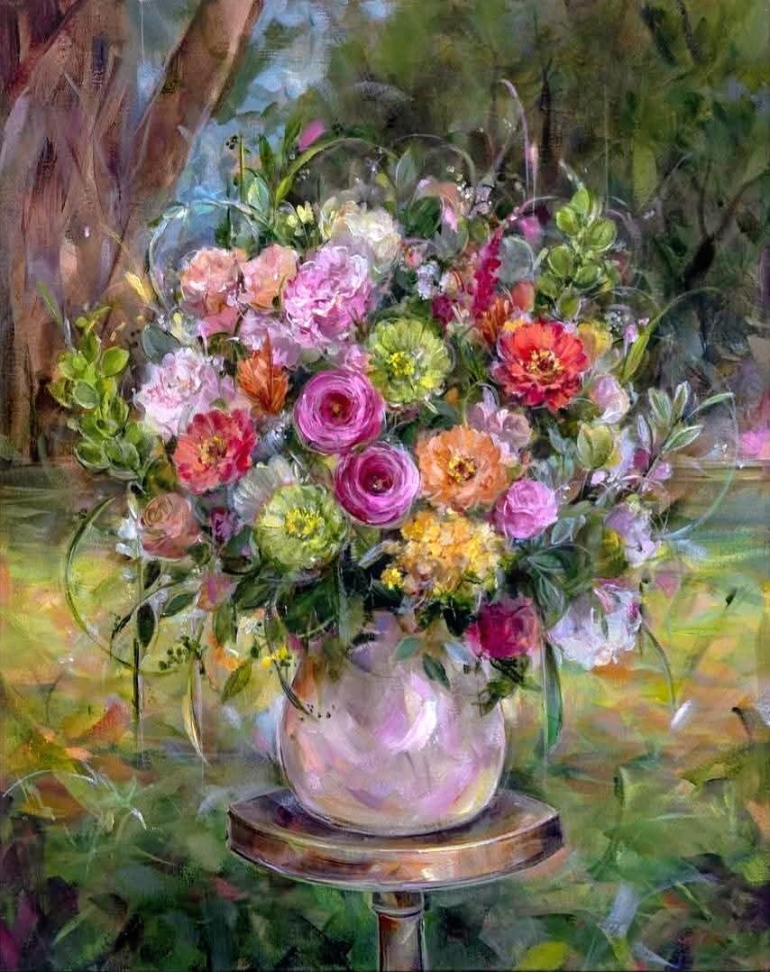 Painting of a colorful bouquet of flowers in a round vase on a small table