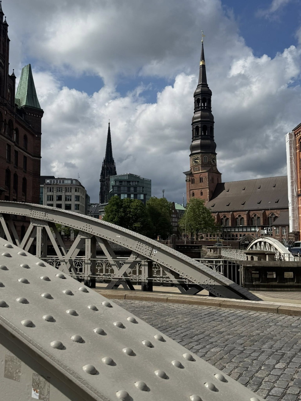 Hamburg harbor scene with waterfront buildings and boats