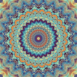 Colorful circular mandala pattern with intricate blue, orange, teal, and purple details