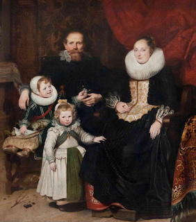 17th century Flemish oil painting of a family of four in elaborate period dress with dark background