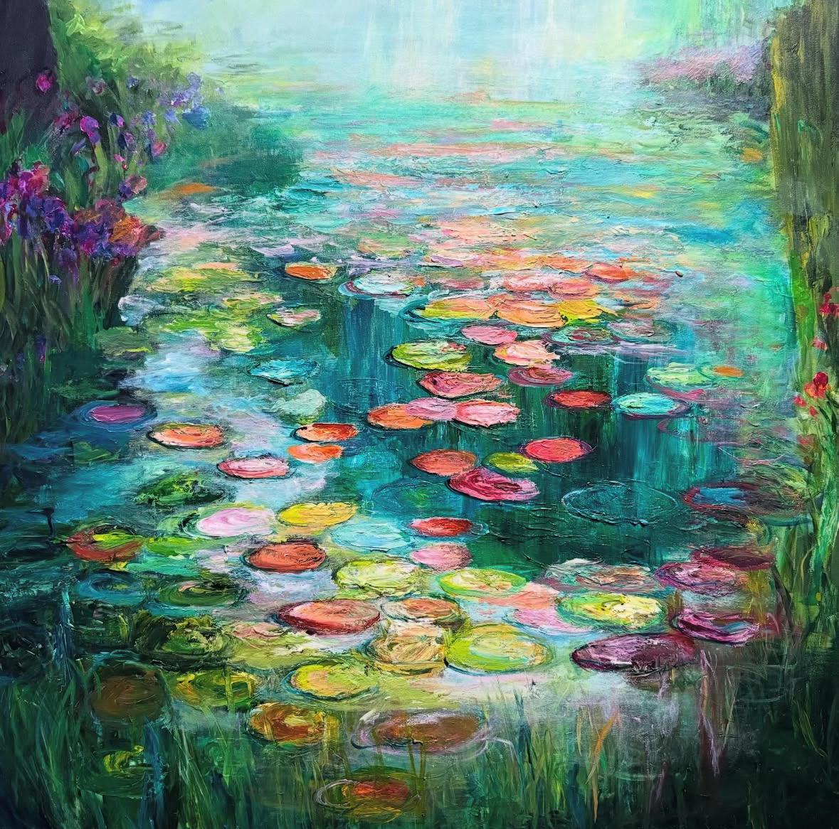 Impressionist painting of colorful water lilies on pond with green foliage